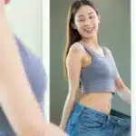 beautiful girl hand show shape her weight loss